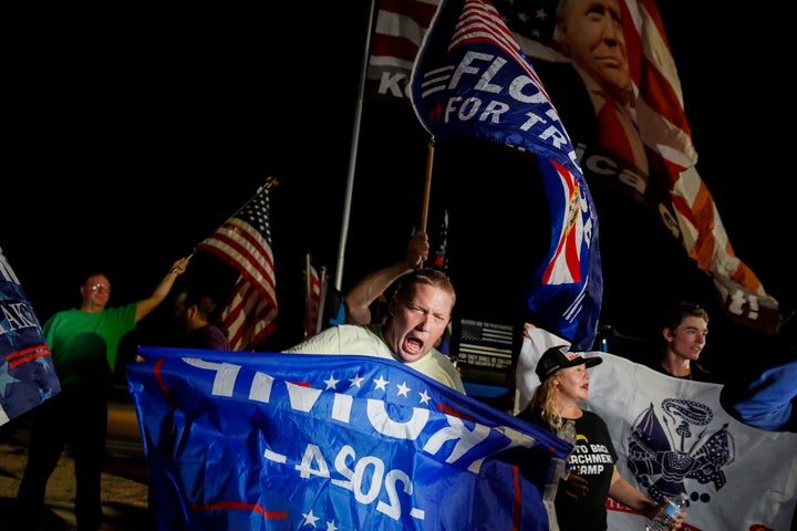 Supporters of former President Donald Trump rally near his home at Mar-a-Lago on Aug. 8 in Palm Beach, Florida.