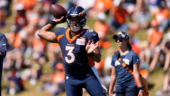Denver Broncos quarterback Russell Wilson (3) takes part in drills during an NFL football training camp session at the team's headquarters Monday, Aug. 8, 2022, in Centennial, Colo. (AP Photo/David Zalubowski)