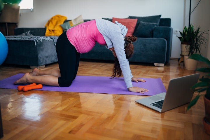 Cat and cow yoga poses help relieve tension in your back and neck.