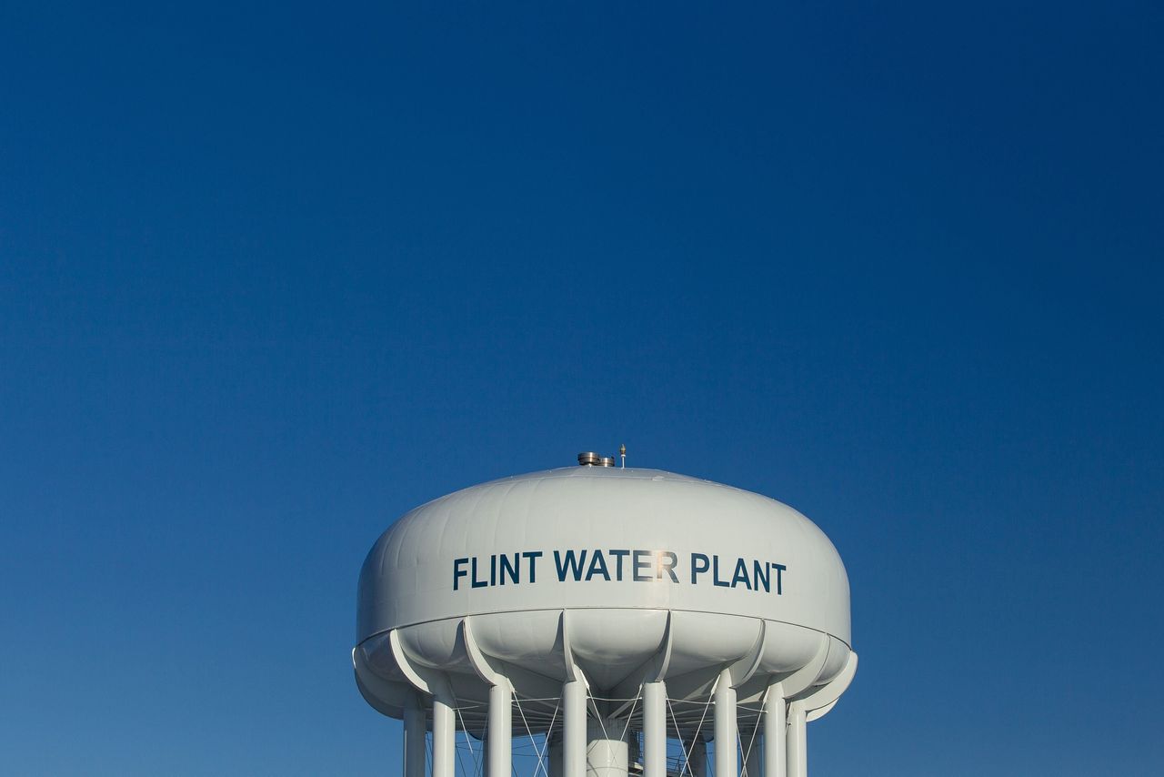 The water tower at the Flint Water Plant looms over Flint, Michigan, on March 4, 2016, nearly two years after the start of the city's water crisis.