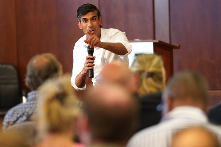 Rishi Sunak talking to a group of people during a visit to St John's Wood Synagogue, north London.