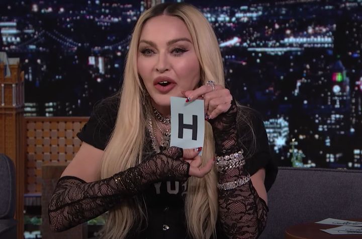 An enthusiastic Madonna playing a word game with Jimmy Fallon