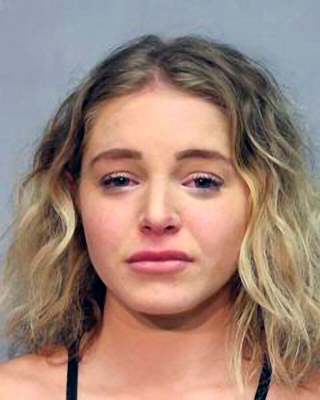 Courtney Clenney is seen following her arrest Wednesday in Hawaii for second-degree murder with a deadly weapon.