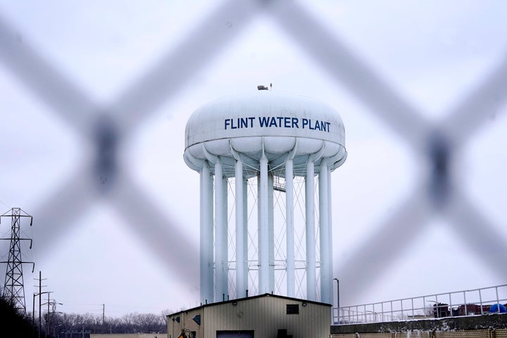 FILE. - The Flint water plant tower is seen, Thursday, Jan. 6, 2022, in Flint, Mich. Jurors heard final arguments Thursday, July 21, in the only civil trial so far arising from the Flint water crisis, a dispute over whether two engineering firms should be held partially responsible for the city's lead contamination in 2014-15.(AP Photo/Carlos Osorio, File)