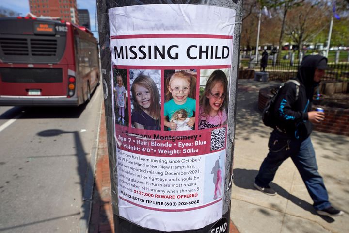 A man walks past the "missing child" poster for Harmony Montgomery, Thursday, May 5, 2022, in Manchester, N.H. The five-year-old girl went missing in 2019. (AP Photo/Charles Krupa)