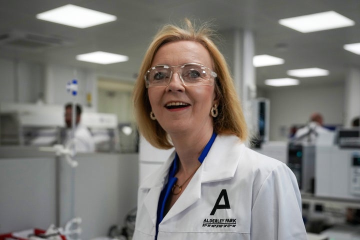 Liz Truss speaks to scientists during a campaign visit to a life sciences laboratory at Alderley Park in Manchester.