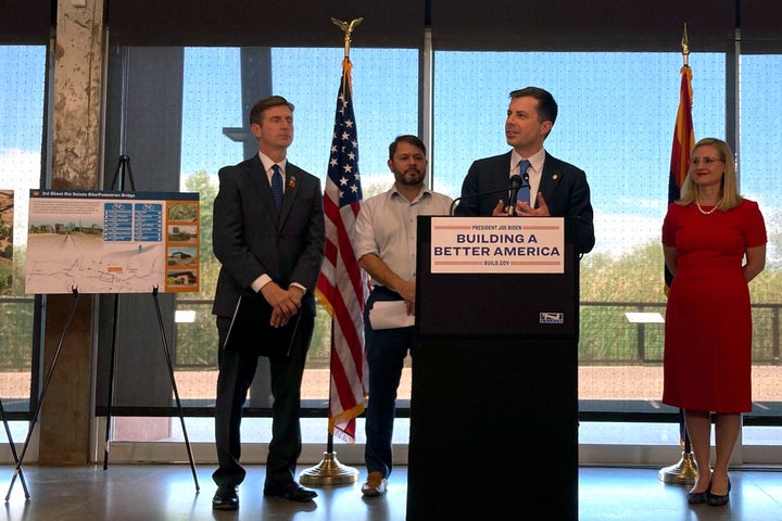 Transportation Secretary Pete Buttigieg, center, flanked by, from left to right, Congressman Greg Stanton, Congressman Ruben Gallego and Phoenix Mayor Kate Gallego, announces the awarding of a grant on Aug. 11, 2022, at the Rio Salado Audubon Center in Phoenix. 