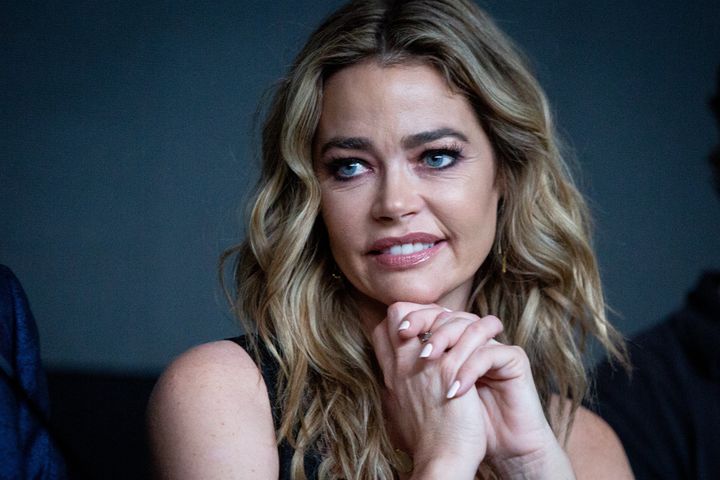 Denise Richards said her relationship with Charlie Sheen was "toxic" and required them to put up a united front in public.