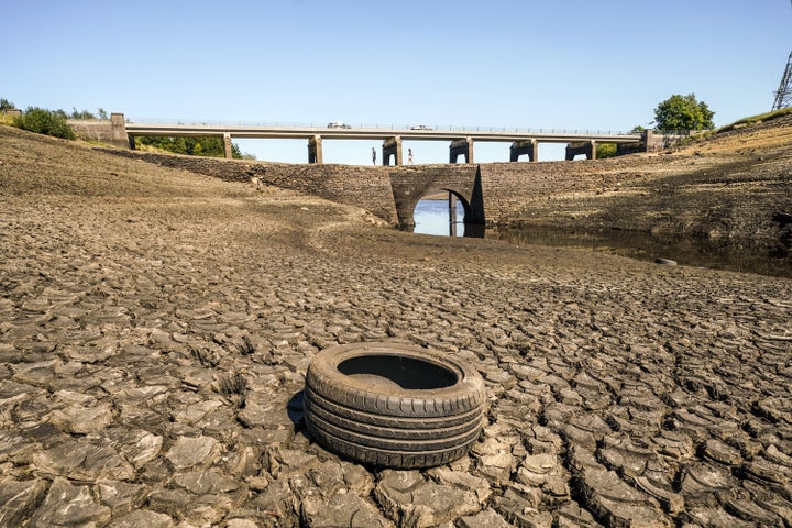 Dry cracked earth at Baitings Reservoir in Ripponden, West Yorkshire.