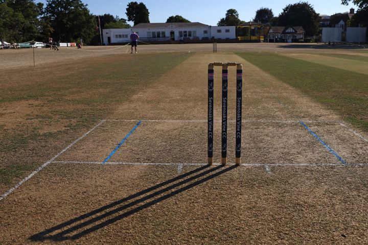 <strong>The long shadow of the stumps is seen on the dry ground at Sevenoaks Vine Cricket Club in Kent.</strong>