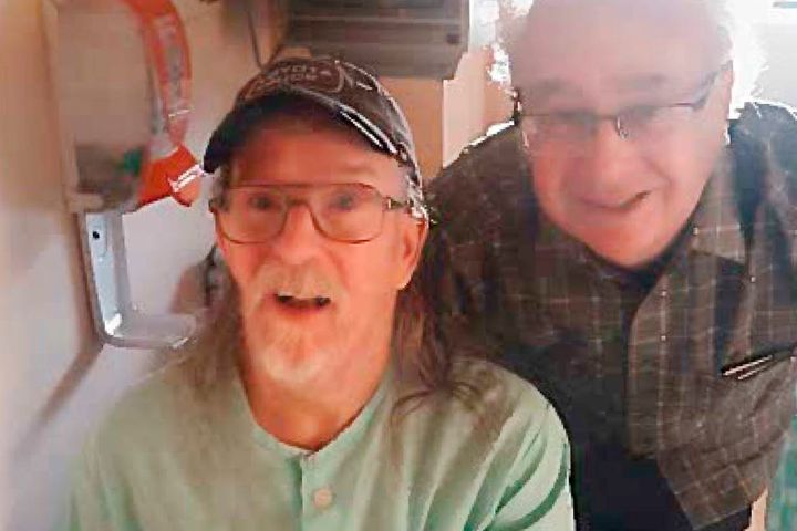 This photo provided by Gary Nichols shows him, right, with his brother, Alan, on the eve of his euthanization in Chilliwack, British Columbia, Canada, in July 2019. 