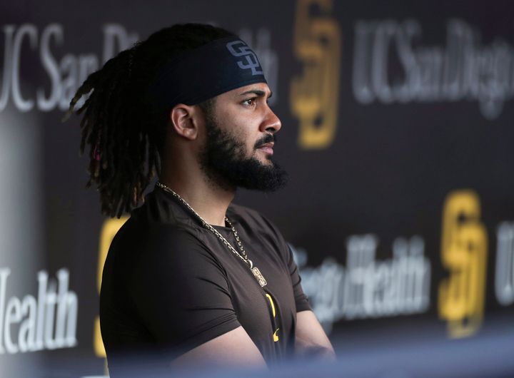 File - San Diego Padres' Fernando Tatis Jr. Looks Out From The Dugout Prior To The Team'S Baseball Game Against The Philadelphia Phillies On June 25, 2022, In San Diego. Tatis Was Suspended 80 Games By Major League Baseball On Friday, Aug. 12, After Testing Positive For A Performance-Enhancing Substance. The Penalty Was Effective Immediately, Meaning The All-Star Shortstop Cannot Play In The Majors This Year. Tatis Had Been On The Injured List All Season After Breaking His Left Wrist In Spring Training. (Ap Photo/Derrick Tuskan, File)