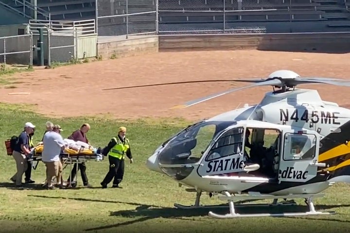 In this still image from video, author Salman Rushdie is taken on a stretcher to a helicopter for transport to a hospital at the Chautauqua Institution.