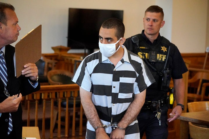 Hadi Matar, 24, center, arrives for an arraignment in the Chautauqua County Courthouse in Mayville, NY., Saturday, Aug. 13, 2022.