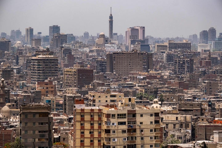 This picture taken on May 26, 2021 from the Cairo Citadel overlooking the Egyptian capital shows a view of the modern Cairo skyline and the Cairo Tower, commissioned by late President Gamal Abdel Nasser and completed in 1961. (Photo by AMIR MAKAR/AFP via Getty Images)