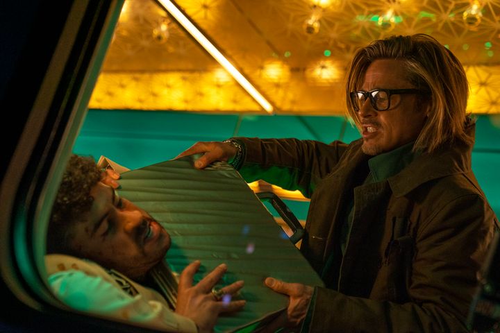 This image released by Sony Pictures shows Bad Bunny, left, and Brad Pitt in a scene from "Bullet Train." (Scott Garfield/Sony Pictures via AP)