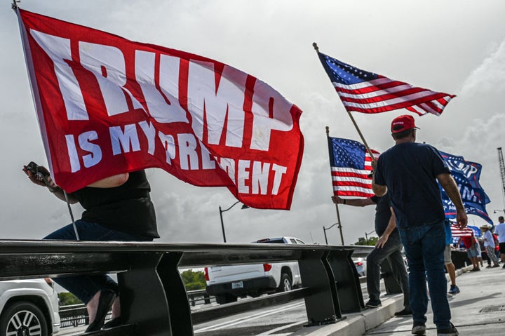 Supporters of former President Donald Trump gather near his residence at Mar-A-Lago in Palm Beach, Florida, after the property was searched by the FBI.