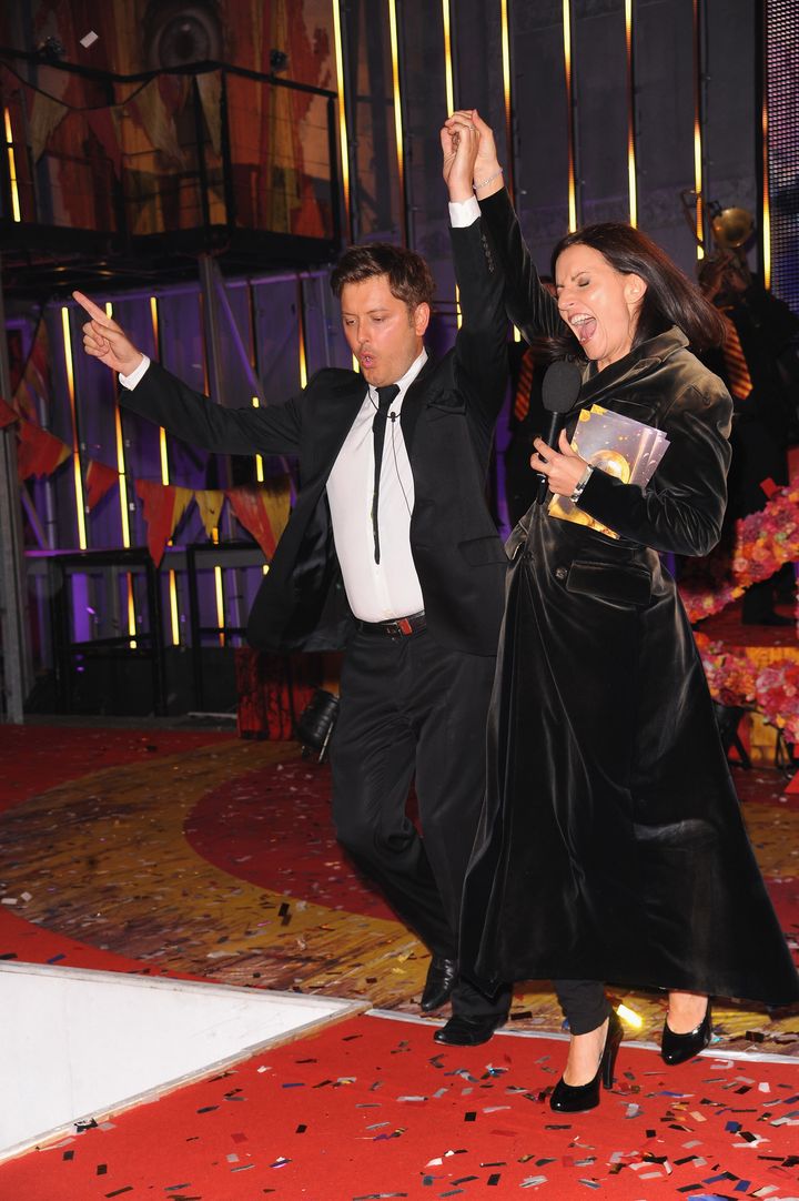 Davina McCall celebrating Brian Dowling's Ultimate Big Brother win in 2010