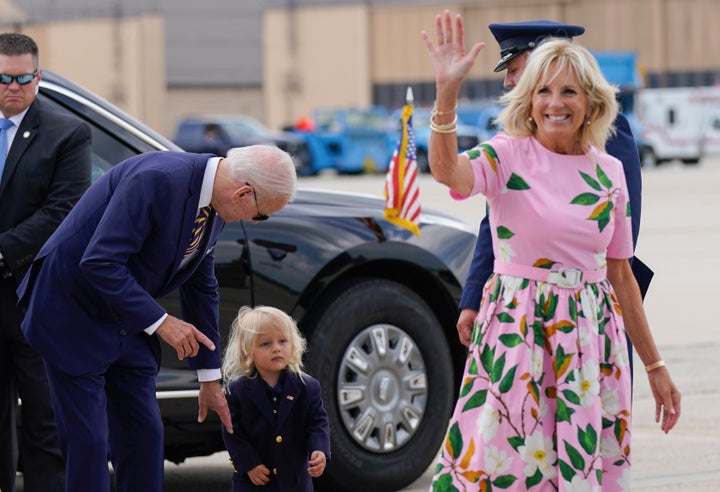 President Joe Biden looks at his grandson Beau Biden as first lady Jill Biden waves and walks to board Air Force One in Maryland on Aug. 10.