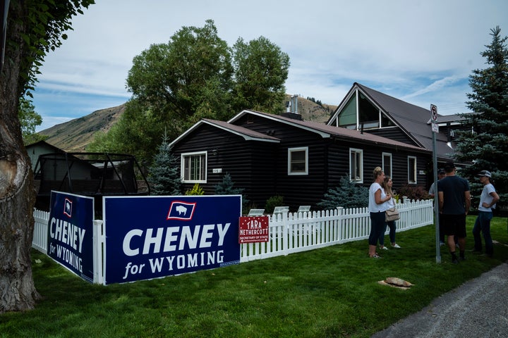 Homes in downtown Jackson, Wyoming, a blue part of the state, displayed signs in support of Cheney, signaling crossover support for her primary.