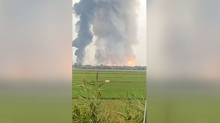 <strong>A still frame from a video taken with a smartphone shows fire and smoke billowing from munitions depot in Crimea early on August 16.</strong>