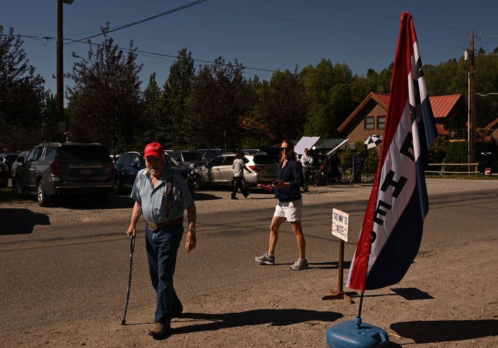 Voters flocked to the community center in Wilson, Wyoming, to vote Tuesday for Liz Cheney and Harriet Hageman in the GOP primary for Wyoming's lone congressional seat.
