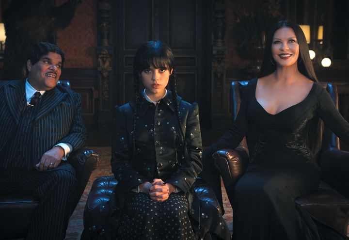 Luis Guzmán as Gomez Addams, Jenna Ortega as Wednesday Addams and Catherine Zeta-Jones as Morticia Adams in Netflix's "Wednesday."