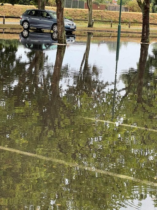 LOUGHBOROUGH: Handout photo taken with permission from the Twitter feed of @tinaonions of flooding in Morrisons car park in Loughborough.