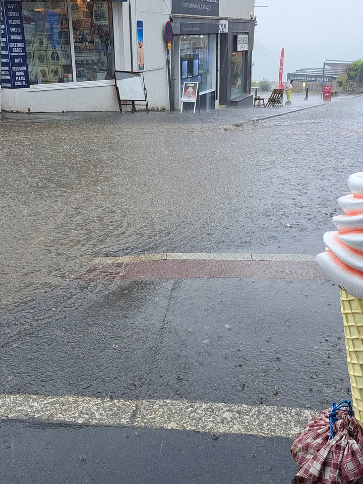 NEWQUAY: Handout photo taken with permission from the Twitter feed of @opheliaspromise of flooding on Marcus Hill in Newquay.