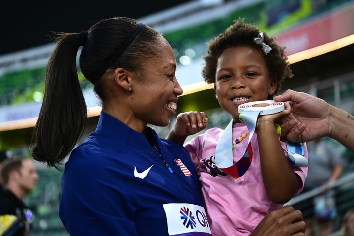 Allyson Felix and her daughter Camryn, 3, with husband Kenneth Ferguson.