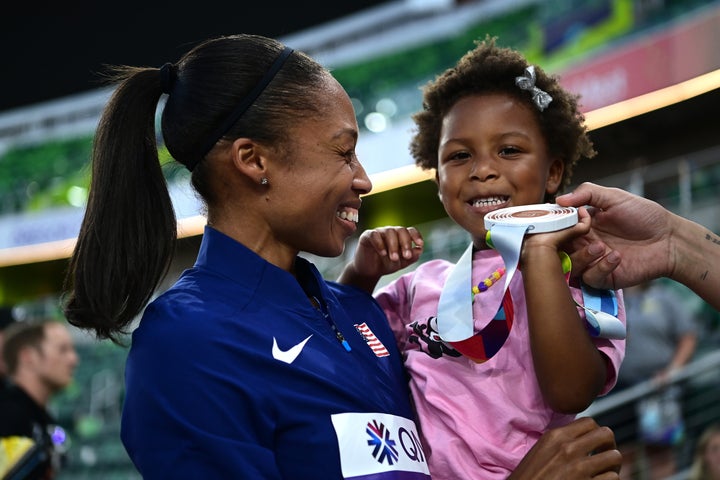 Allyson Felix and her daughter Camryn, 3, with husband Kenneth Ferguson.