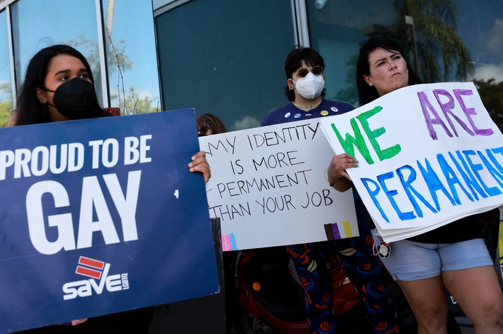 People protest in front of Florida state Sen. Ileana Garcia's Miami office after the passage of the Parental Rights in Education bill, dubbed the "Don't Say Gay" bill by LGBTQ activists, in March. The bill limits what classrooms can teach about sexual orientation and gender identity.