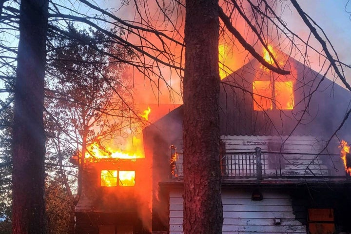 A fire consumes a building at the long-closed Grossinger's resort in Liberty, New York on Tuesday.