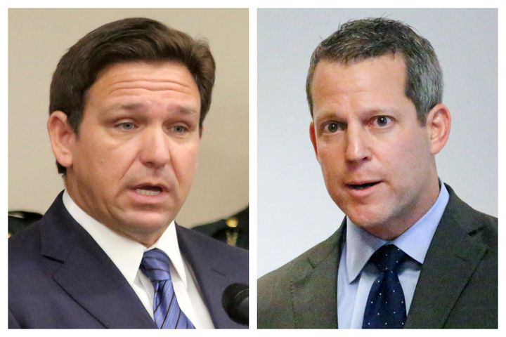 This combination of Aug. 4, 2022 photos shows Florida Gov. Ron DeSantis, left, and Hillsborough County State Attorney Andrew Warren during separate news conferences in Tampa, Fla. 