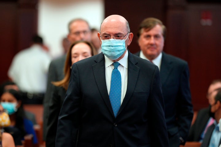 The Trump Organization's former accountant Allen Weisselberg, right, arrives in the courtroom, in New York, Thursday, Aug. 18, 2022.