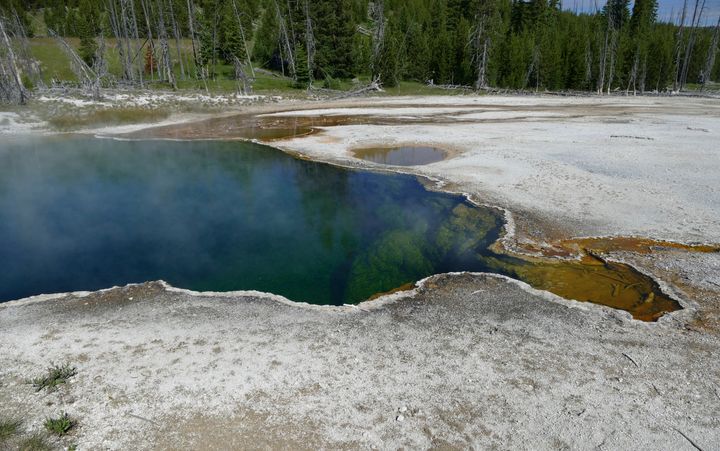 The Abyss Pool hot spring in the southern part of Yellowstone National Park.