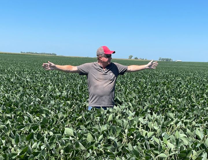 Dan Tronchetti, 66, holds his arms out to show where a proposed carbon dioxide pipeline would run through his 1,500-acre farm in Iowa, 60 miles northwest of Des Moines.