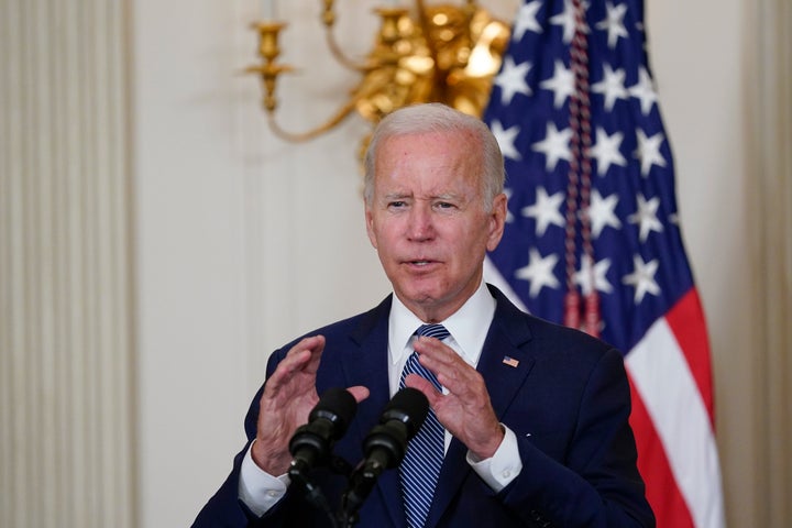 FILE - President Joe Biden speaks before signing the Democrats' landmark climate change and health care bill in the State Dining Room of the White House in Washington, Aug. 16, 2022. Biden and his allies hope big recent wins on climate, health care and more will at least temporarily tamp down questions among top Democrats about whether he will run for reelection. (AP Photo/Susan Walsh, File)