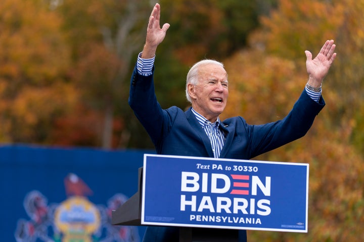 FILE - Democratic presidential candidate former Vice President Joe Biden speaks at a drive-in campaign stop at Bucks County Community College in Bristol, Pa., Oct. 24, 2020. Biden and his allies hope big recent wins on climate, health care and more will at least temporarily tamp down questions among top Democrats about whether he will run for reelection. (AP Photo/Andrew Harnik, File)