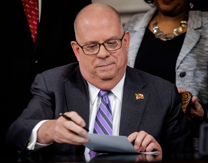 FILE: Maryland Gov. Larry Hogan, seen here signing Retirement Tax Elimination Act, criticized GOP gubernatorial candidate Dan Cox for his comments on former Vice President Mike Pence.