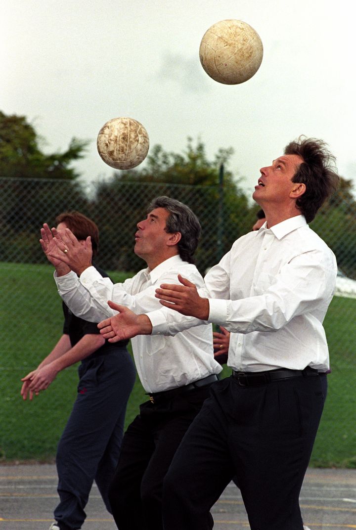 Labour leader Tony Blair takes part in a ball-heading contest with Newcastle United boss Kevin Keegan in 