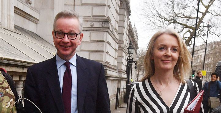 Michael Gove and Liz Truss after leaving Downing Street.