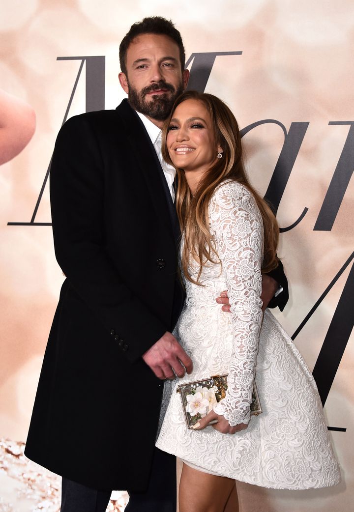 Jennifer Lopez, right, and Ben Affleck attend a photo call for a special screening of Marry Me at DGA Theater on Tuesday, Feb. 8, 2022, in Los Angeles. (Photo by Jordan Strauss/Invision/AP)
