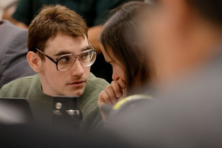 Marjory Stoneman Douglas High School shooter Nikolas Cruz speaks with a sentence mitigation specialist, who's a member of his defense team, during the penalty phase of his trial in Florida on August 3.