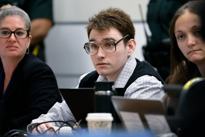 Marjory Stoneman Douglas High School shooter Nikolas Cruz watches as his attorney, Melisa McNeill, gives the defense's opening statement during the penalty phase of his trial in Fort Lauderdale on Monday.