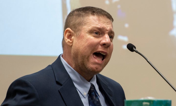 Jacob Blair Scott reacts at his trial in Mississippi's Jackson County Circuit Court in June. Scott pleaded guilty Monday in federal court to faking his own death in a bid to avoid sexual abuse charges.