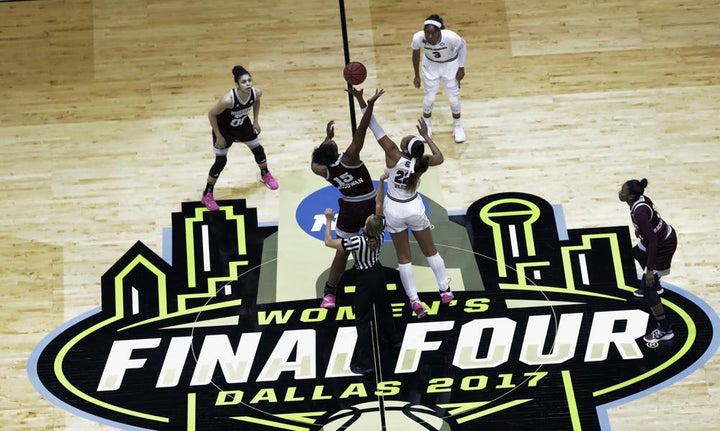 FILE - Mississippi State center Teaira McCowan (15) and South Carolina forward A'ja Wilson (22) reach for the ball on the opening tipoff of the final of the NCAA women's college basketball tournament on April 2, 2017.