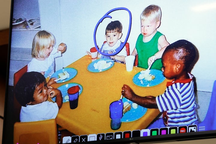 Cruz, circled in blue, is shown sitting with classmates in an undated photo from the Young Minds Learning Center as Anne Marie Fischer, the school's former director, testified during the penalty phase of Cruz's trial on Tuesday.