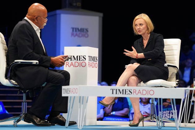 Times Radio presenter John Pienaar speaking to Liz Truss during a hustings event at the NEC in Birmingham.