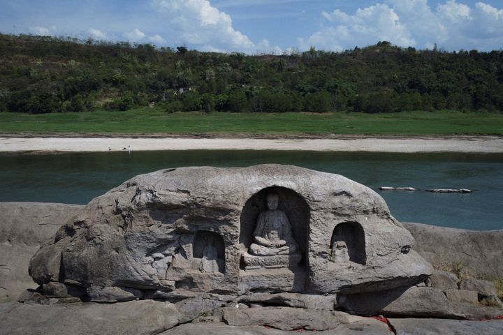 Receding water levels previously revealed the three Buddhist statues in 2020.